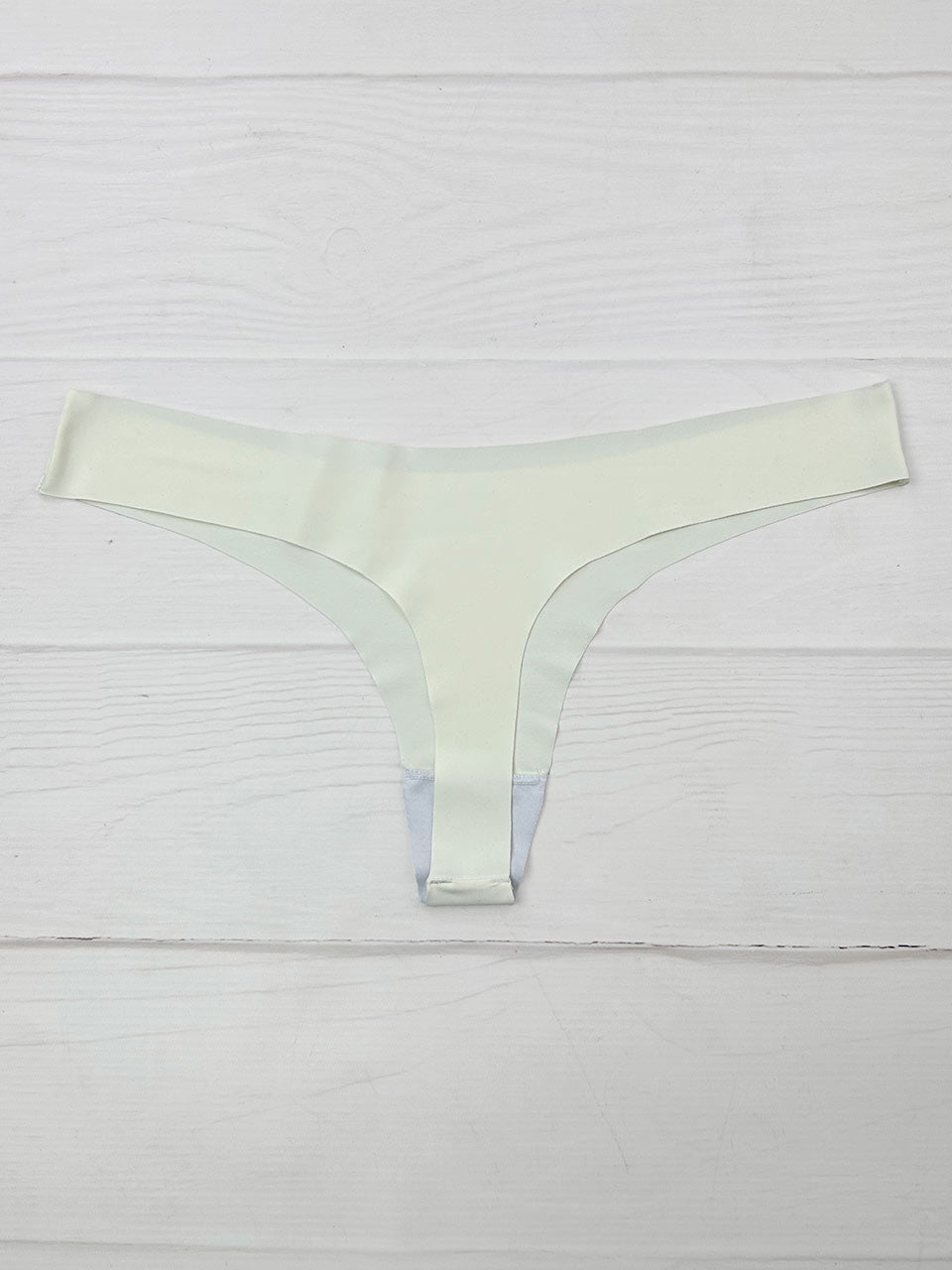 Tanga invisible marfil