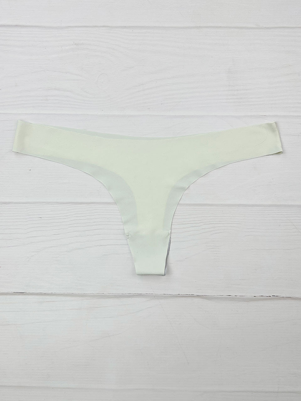 Tanga invisible marfil