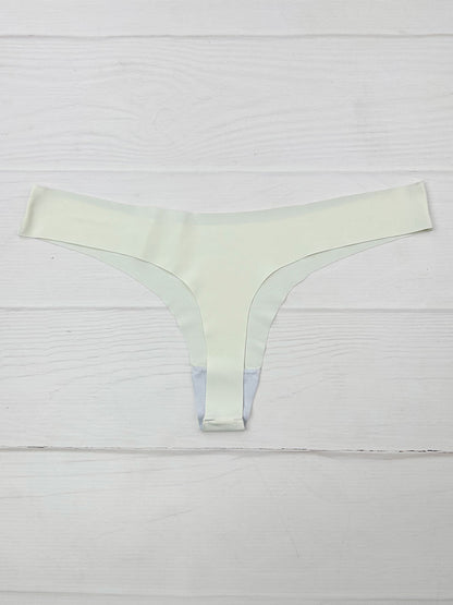 Tanga invisible marfil